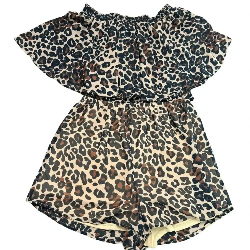 Excellent condition Show Me Your Mumu cheetah print shorts romper. Medium.